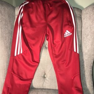 Beautiful red adidas joggers.